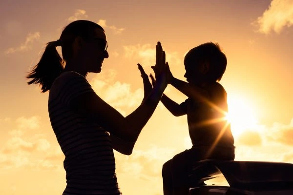 Image of happy mother and child after resolving child arrangements Ipswich